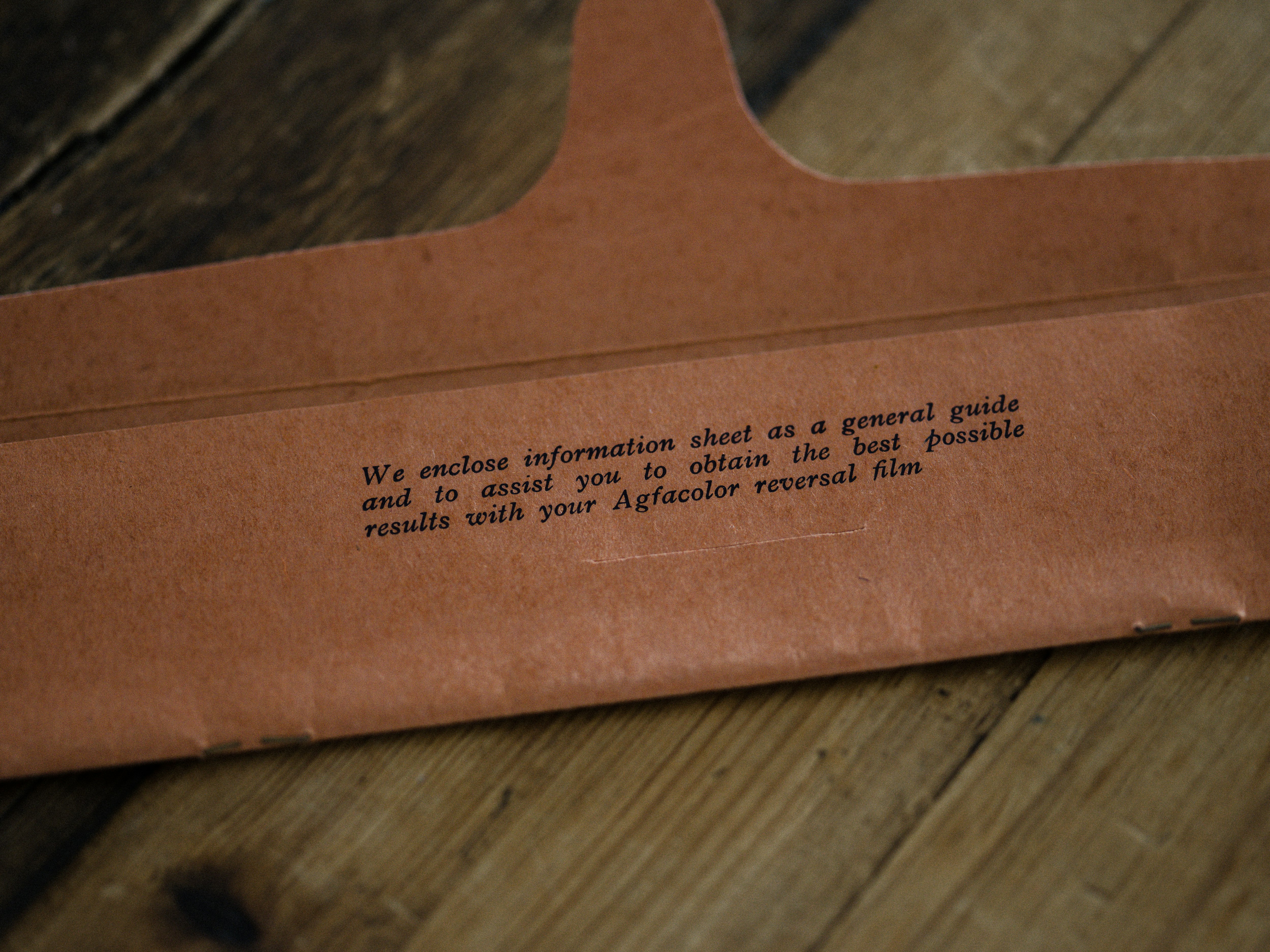 brown envelope on brown wooden table